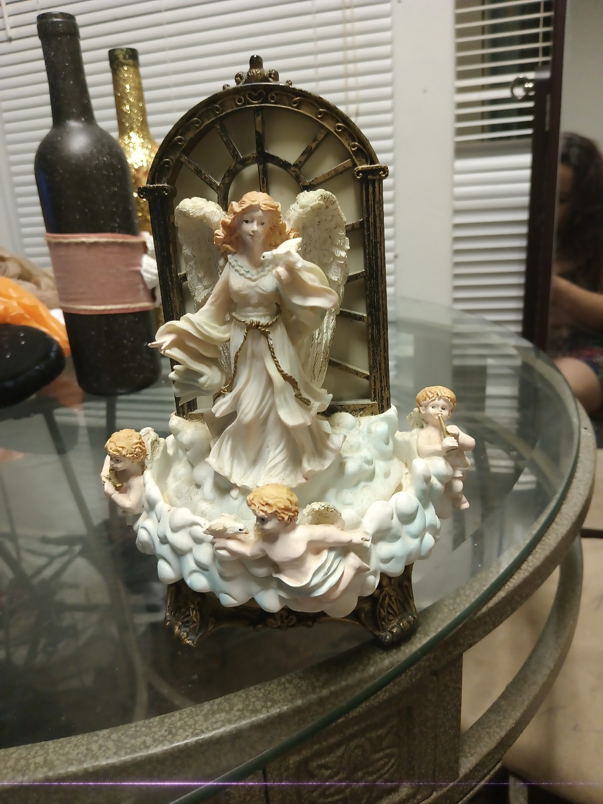 Ceramic figure that has angel and play a beautiful tune with it