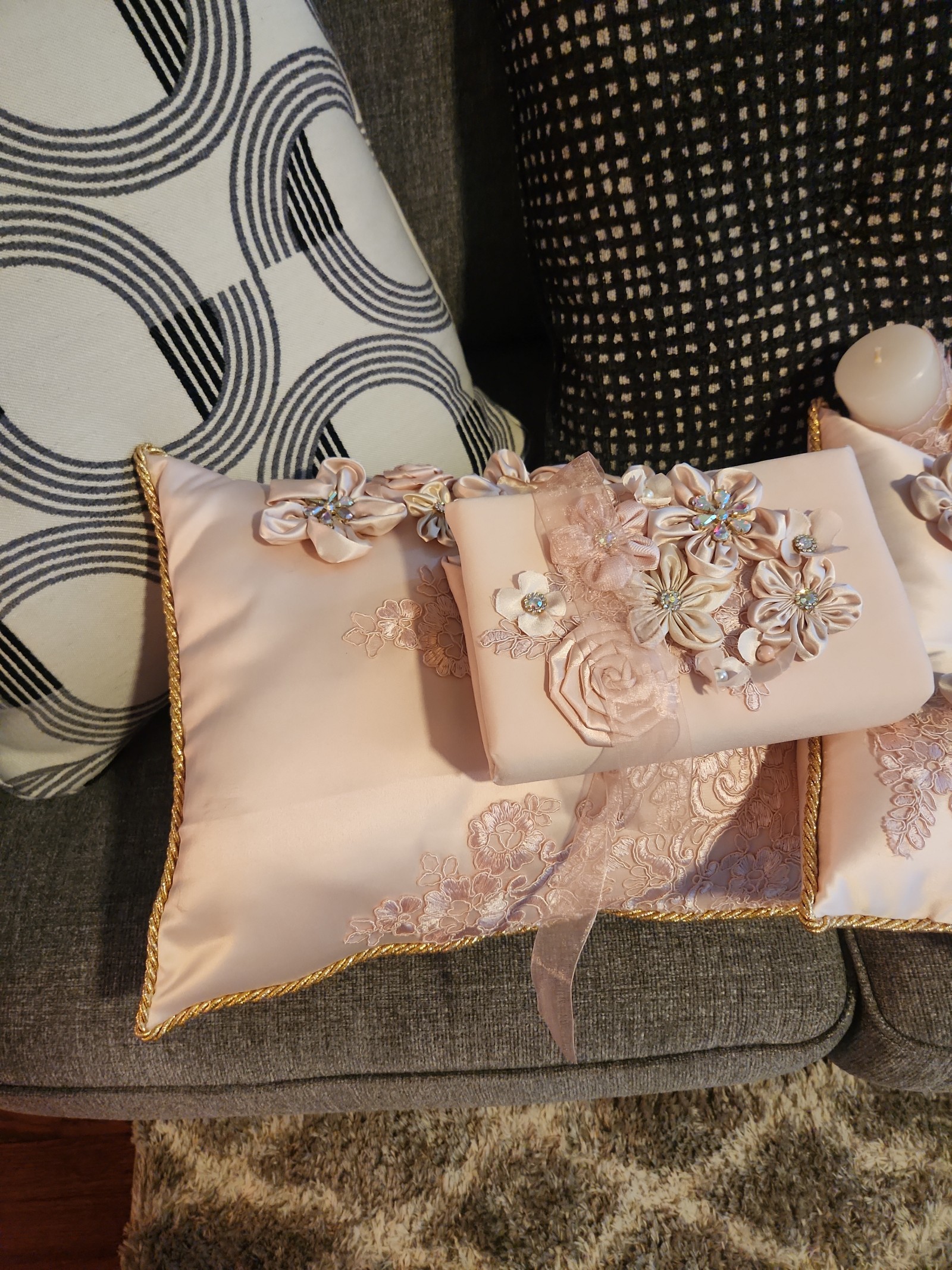 Light pink Quince church pillow, candle & Bible
