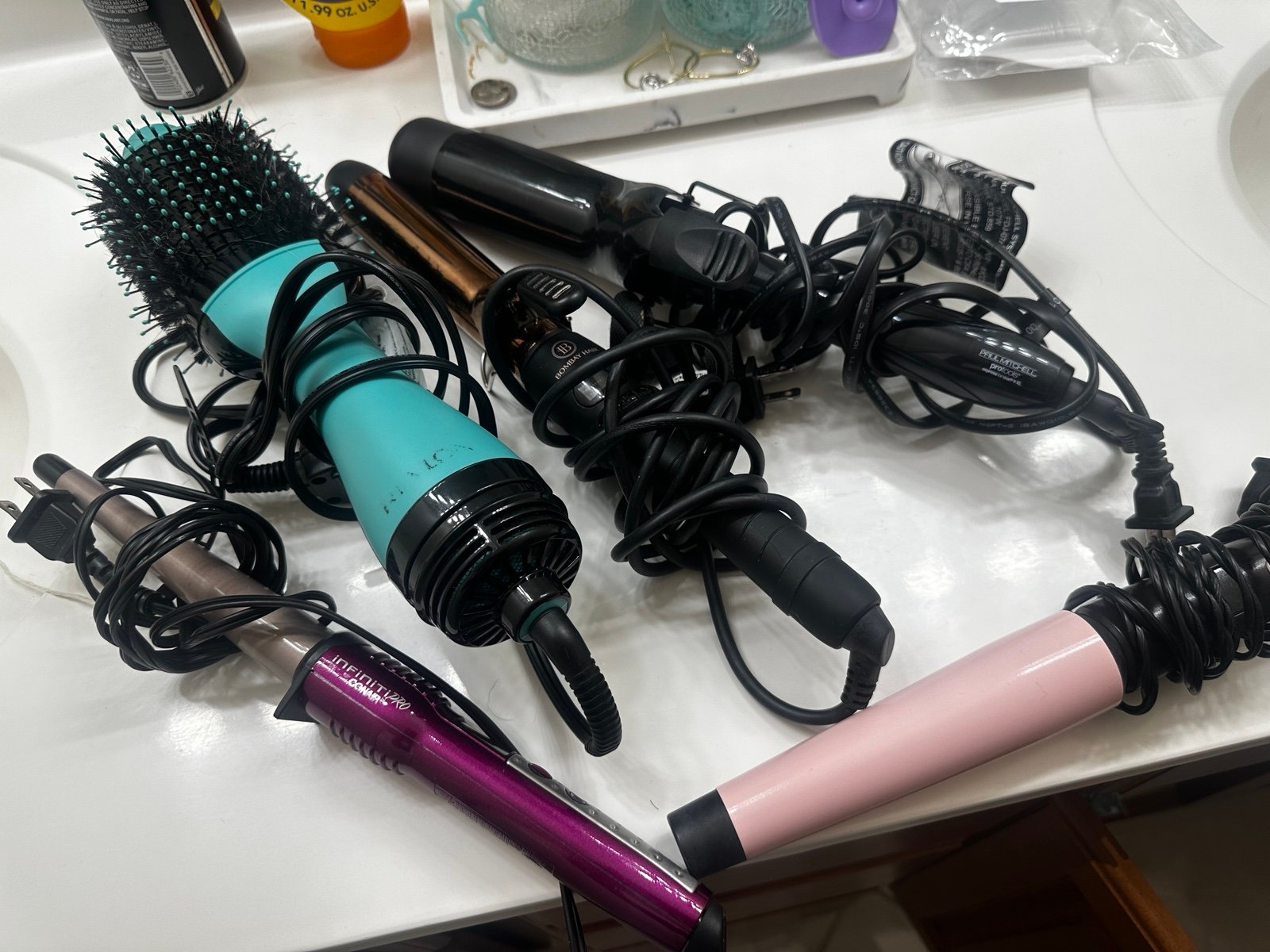 Hair curling iron and revlon brush