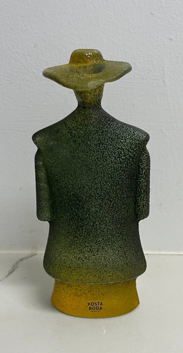 Contemporary Kosta Boda Sweden “Green Poncho Man on Catwalk” Art Glass Sculpture