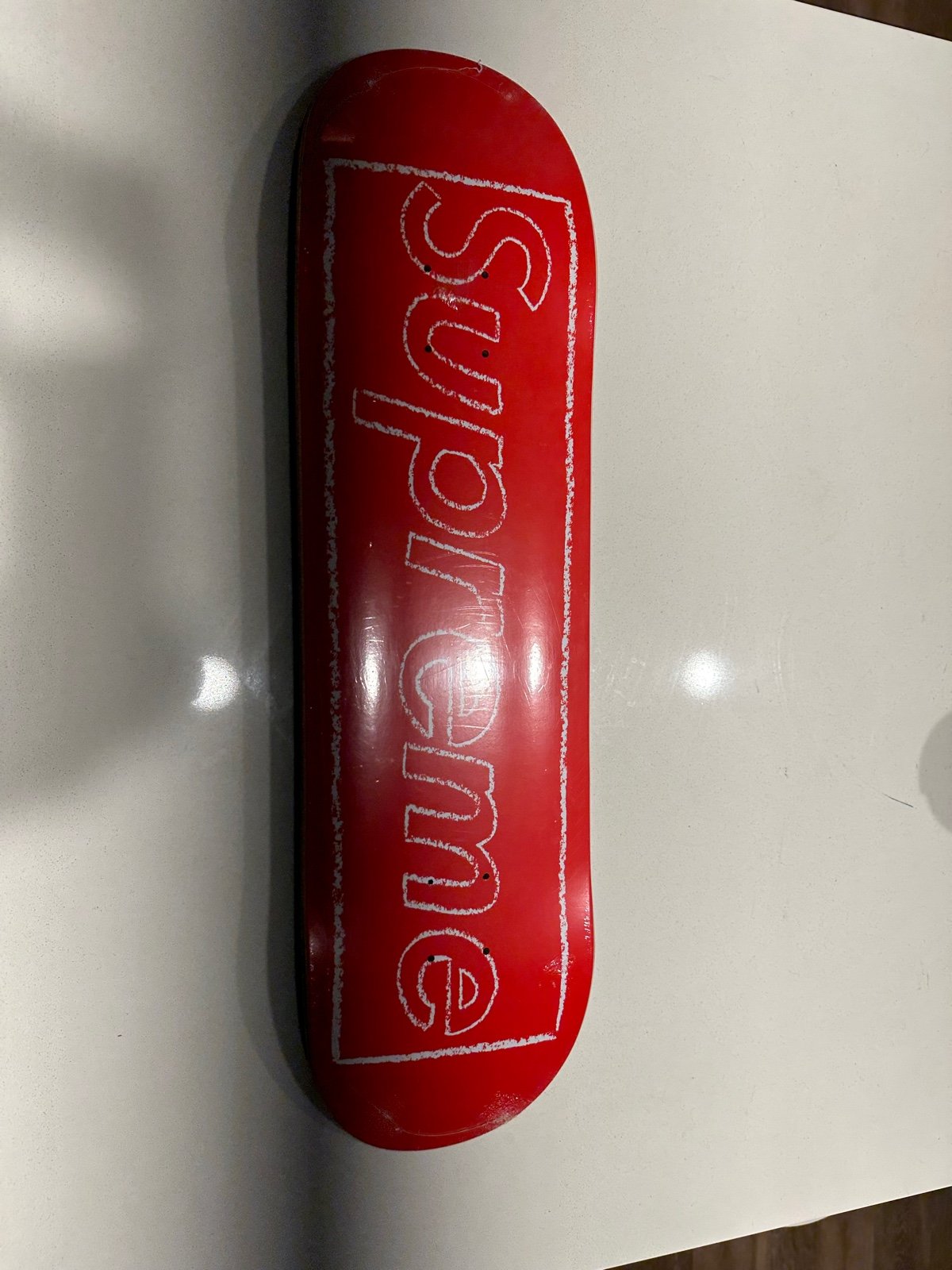 Supreme kaws skateboard