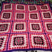 pink granny square afghan
