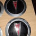 Pontiac 6000 wire hubcap emblems