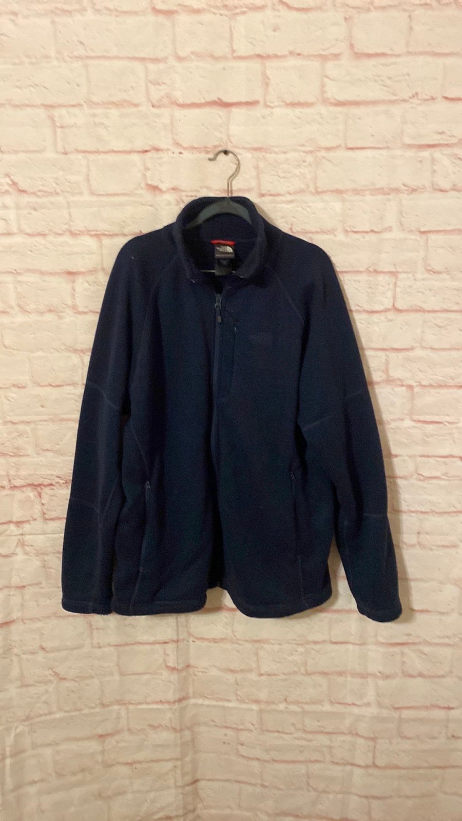 The North Face men’s navy full-zip fleece jacket