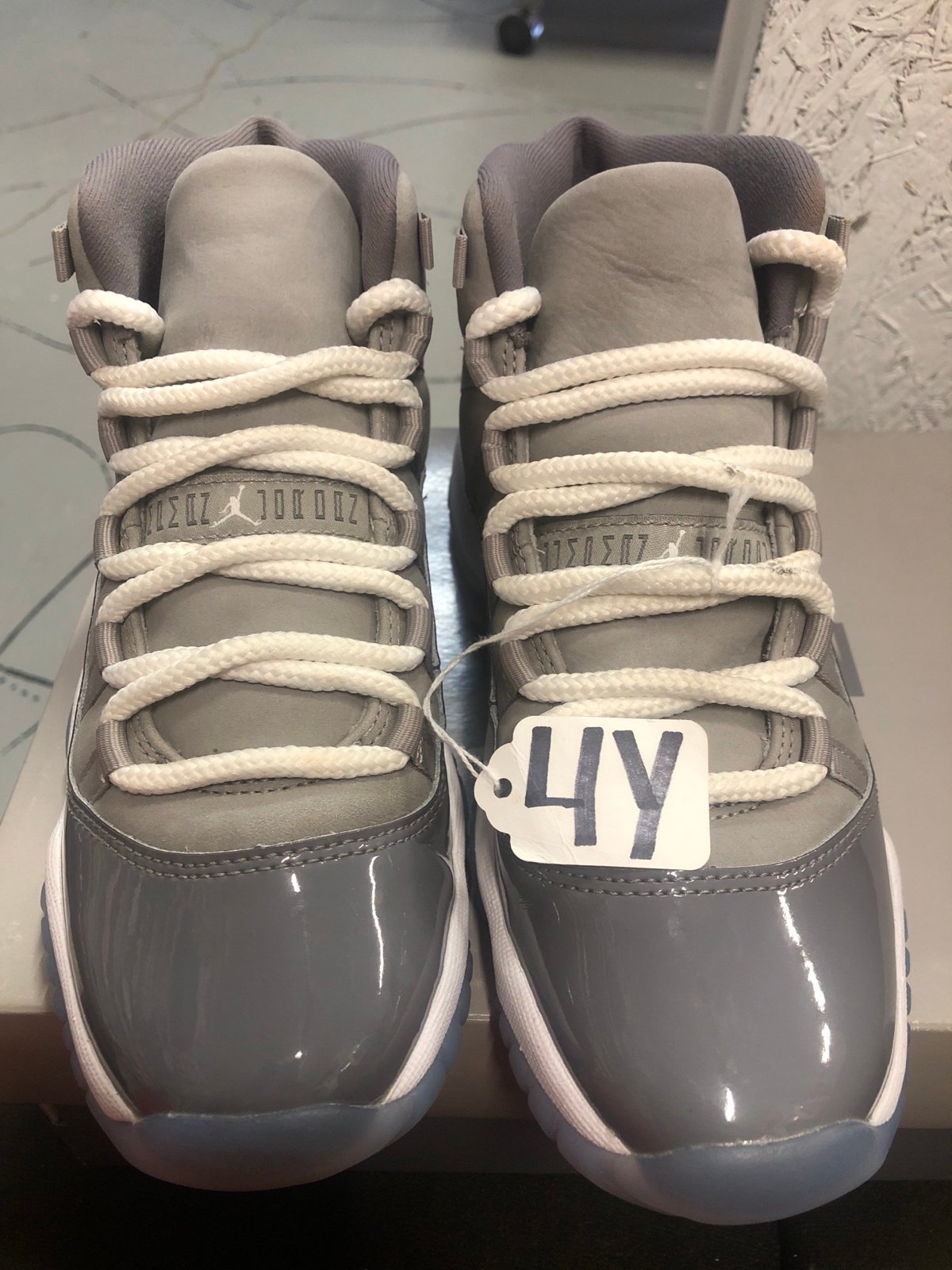 Nike air Jordan 11 Retro color grey for the girls and boys size 4Y whit box