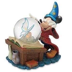 Sorceror Mickey conjures a butterfly snowglobe