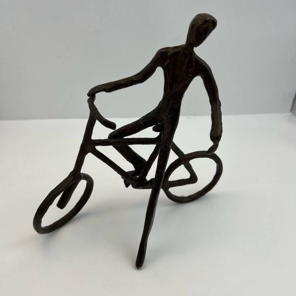 Metal Sculpture Figure Of Man/Boy On Bicycle Iron brown statue