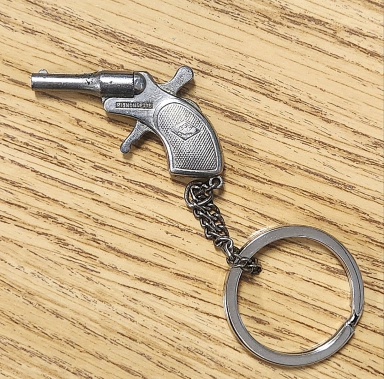 Vintage Molgora Mignonnette Toy Cap Gun Keychain