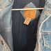Vintage denim jacket with flannel sleeves