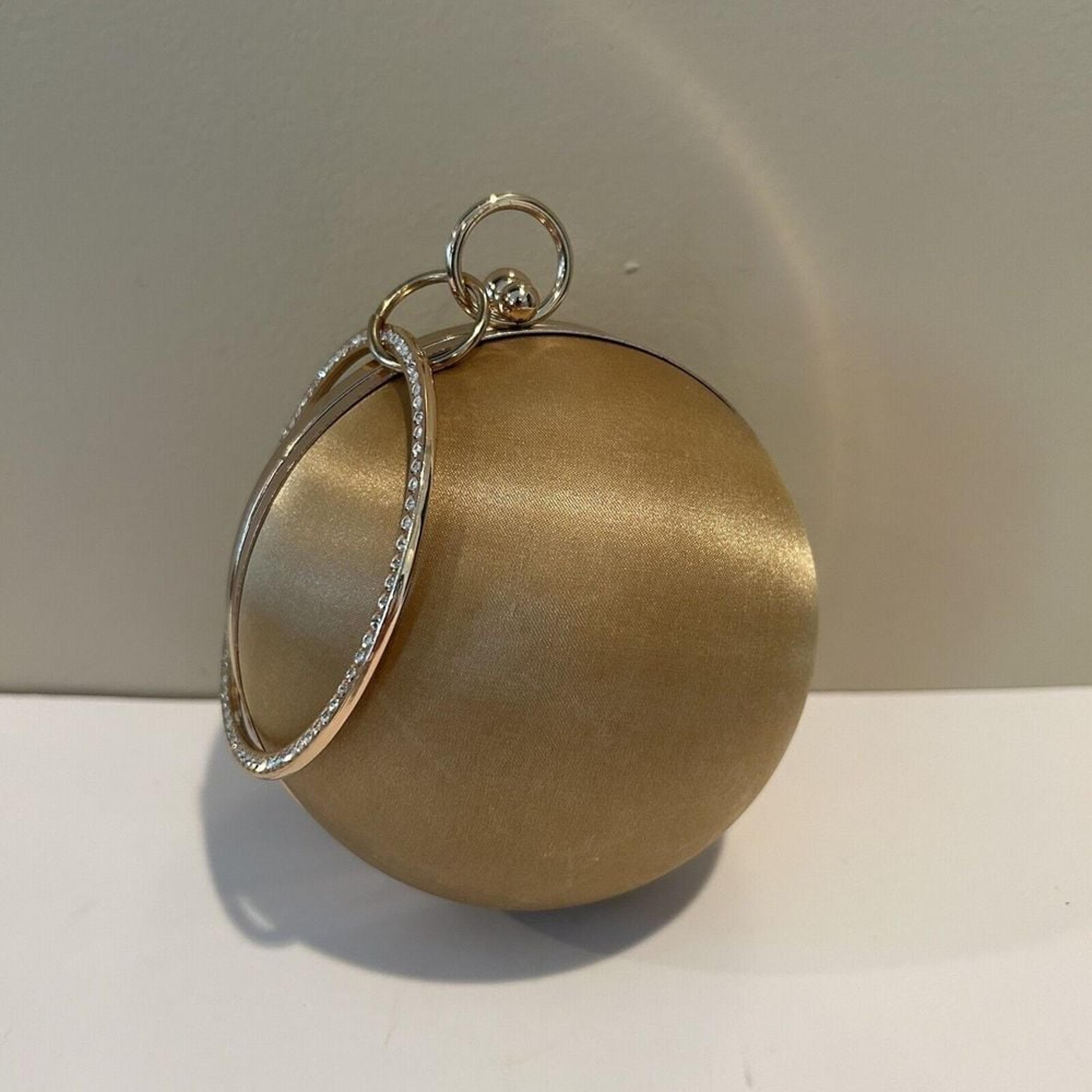 Versona ball Gold clutch purse