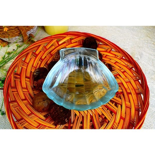 Set of four Pyrex shell, scalloped dipping dishes.