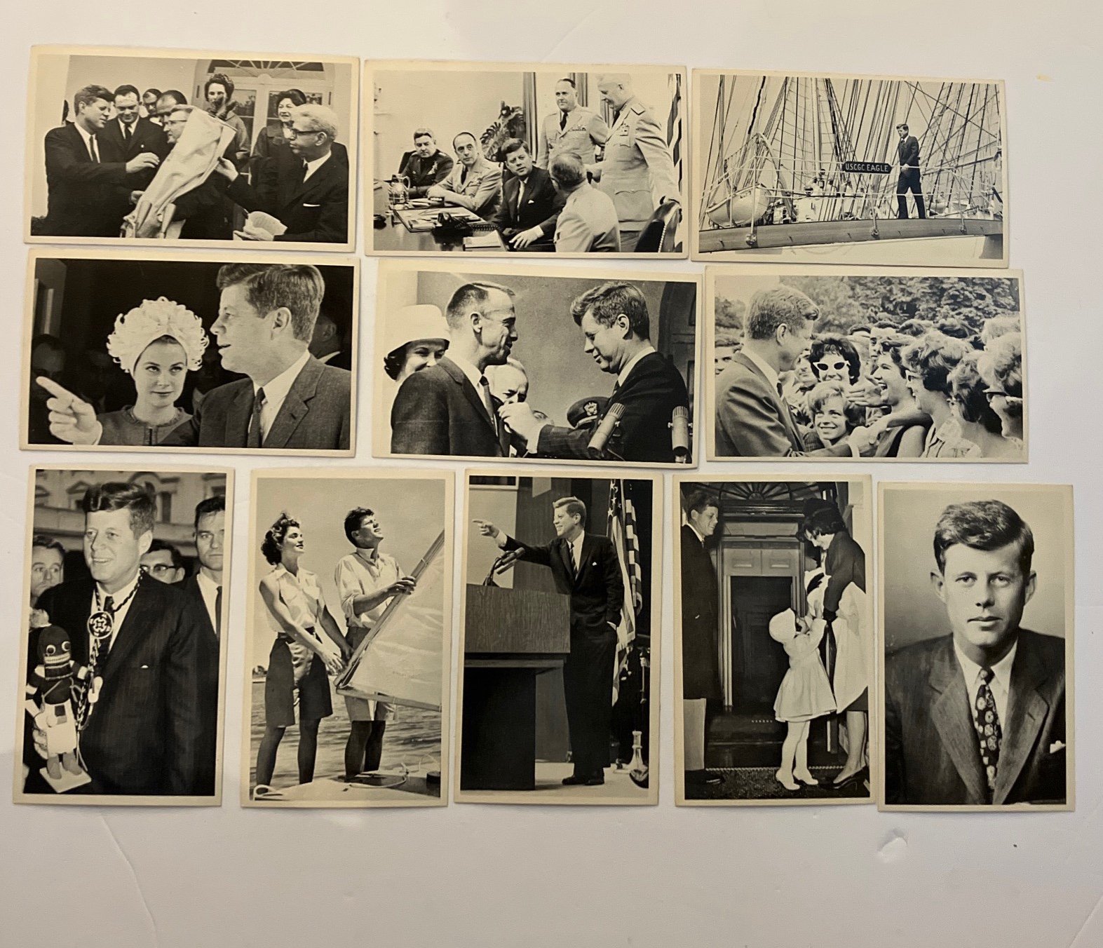 This vintage lot of 40 black and white photo cards features John F Kennedy