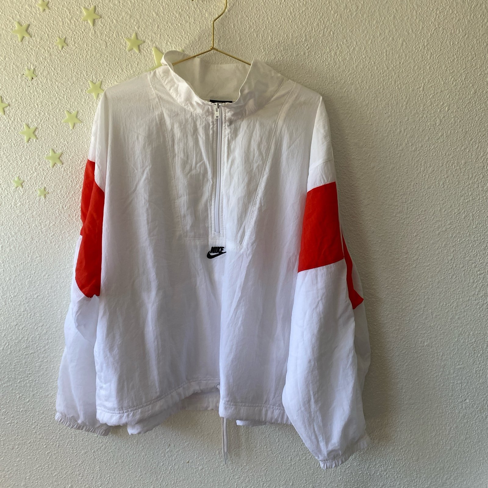 Nike white and red windbreaker half zip with draw string at the bottom