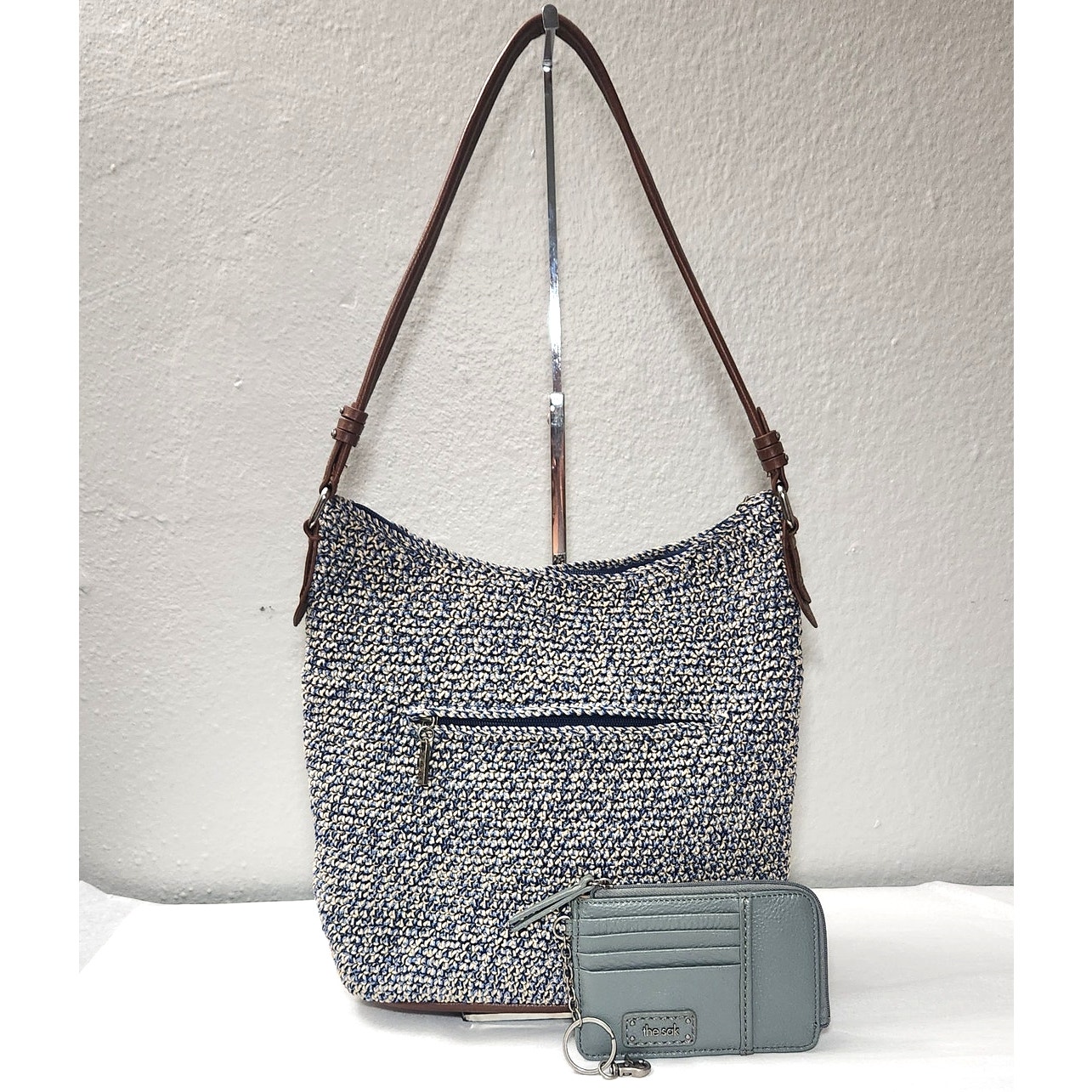 The Sak Sequoia Crochet Hobo Bag in Denim Static with Slate Gray Card Wallet