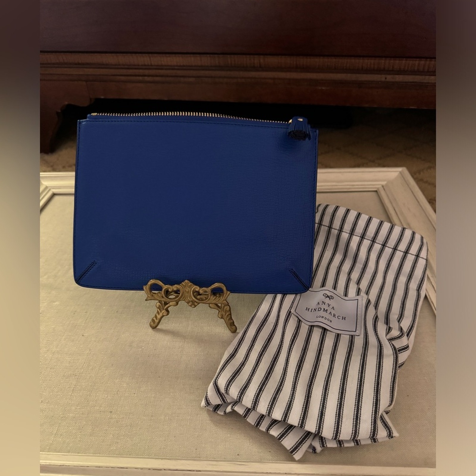 Anya Hindmarch leather royal blue clutch pouch with tassel zip close