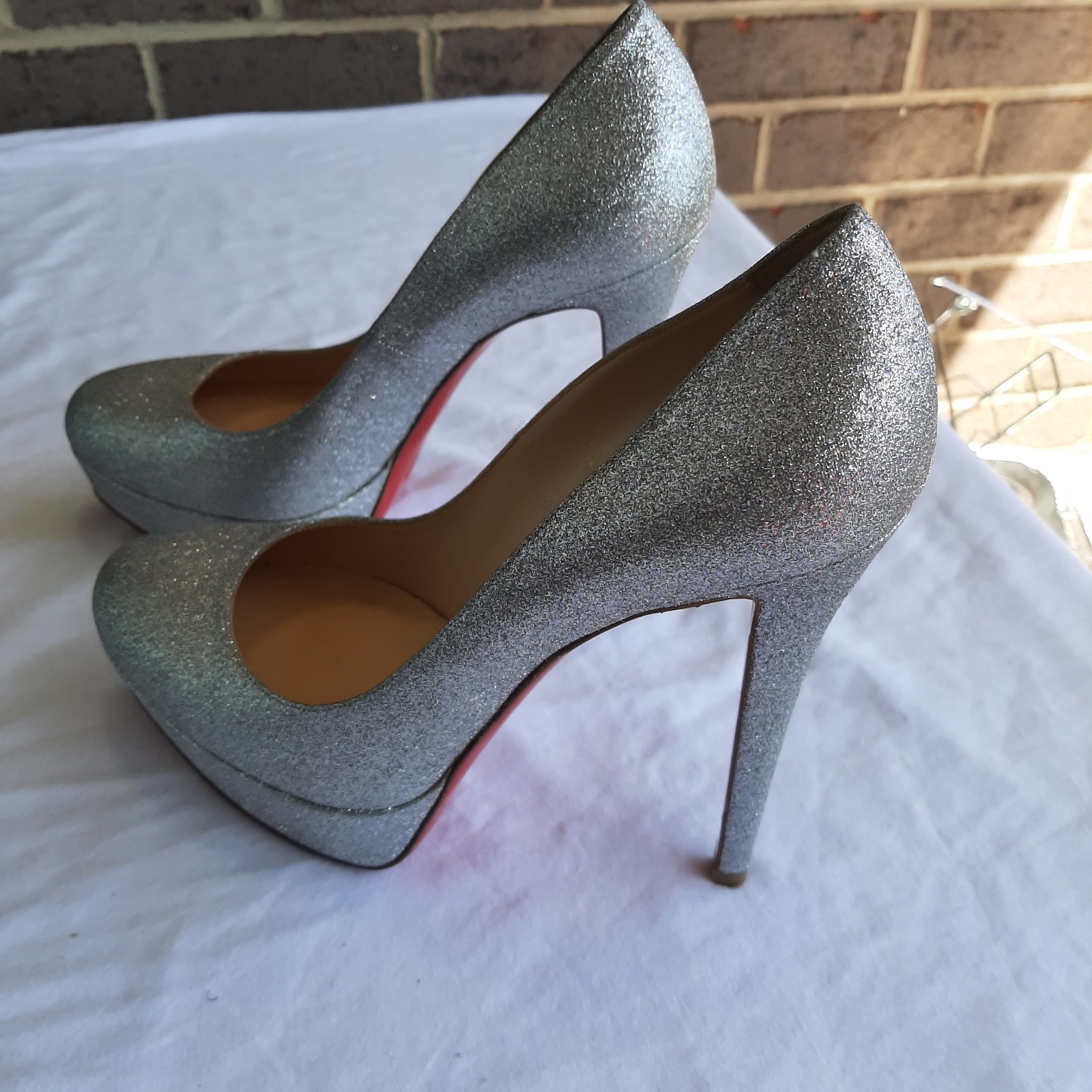 Christain Louboutin size 40 silver heels