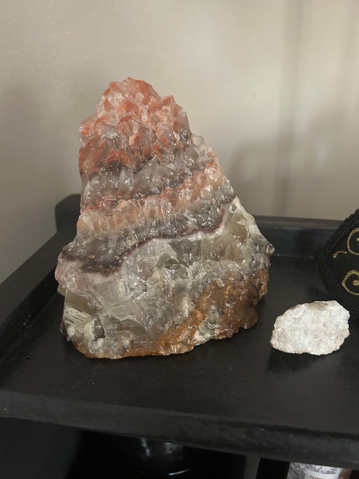 Heavy red banded calcite chunk cut base