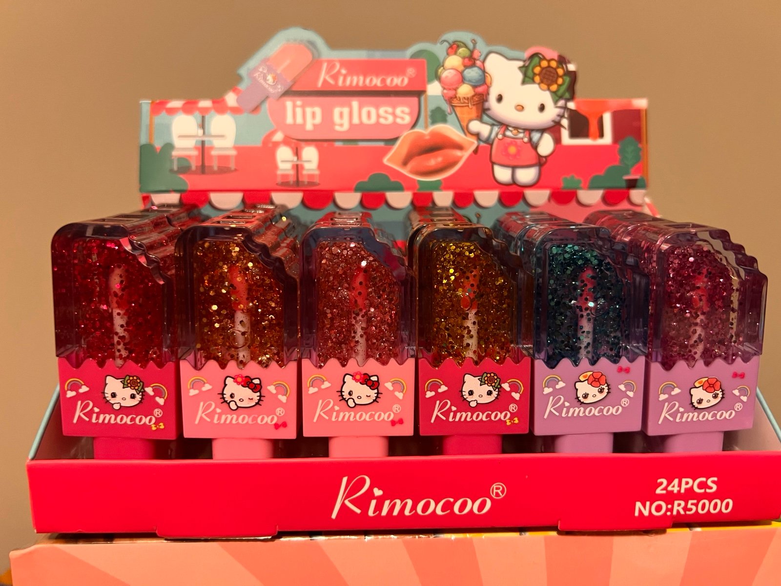 Glitter lip tint display of 24