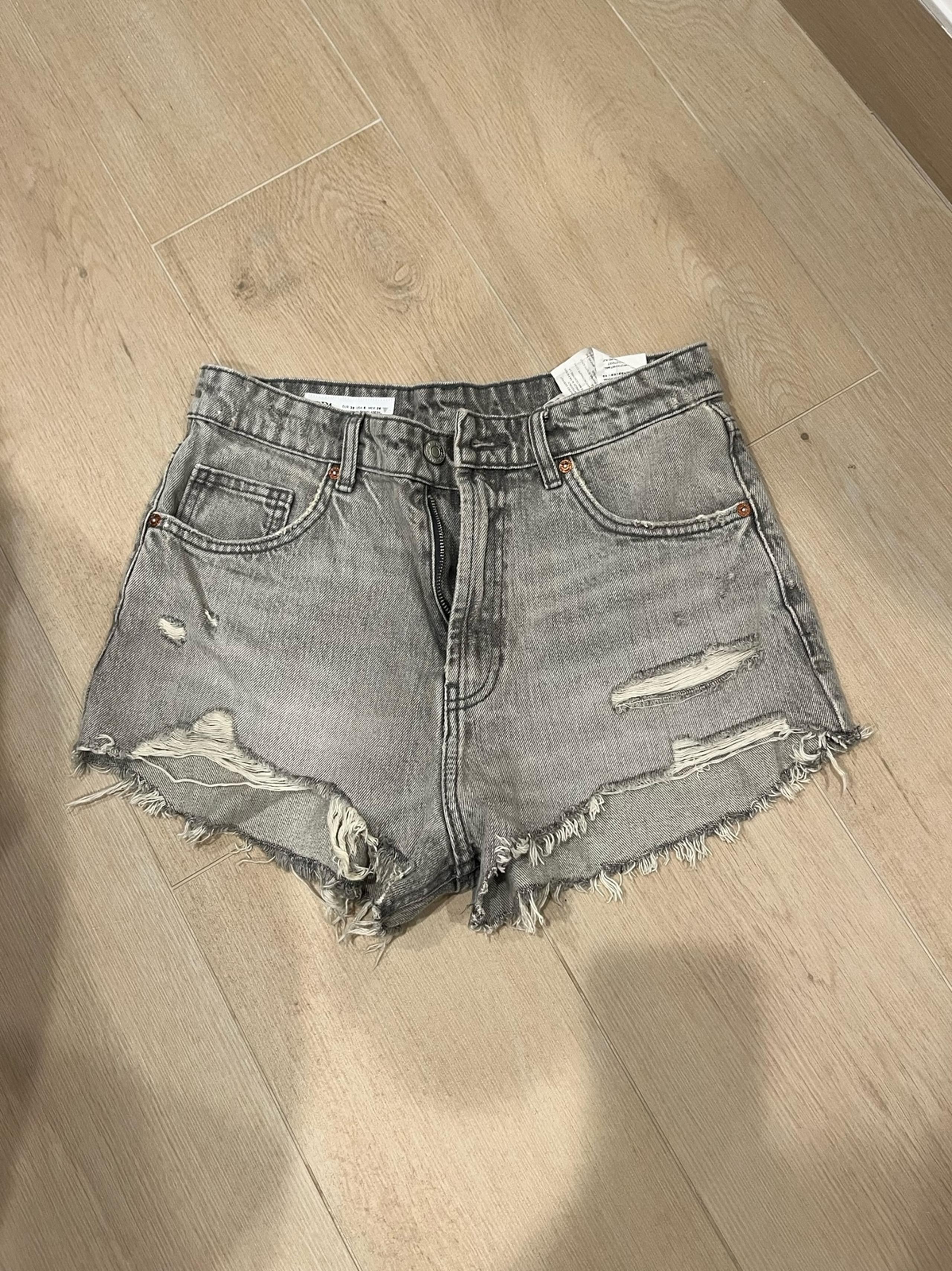 Zara Gray Distressed Jean Shorts Casual Style. High rise. New with tags. Size 6.