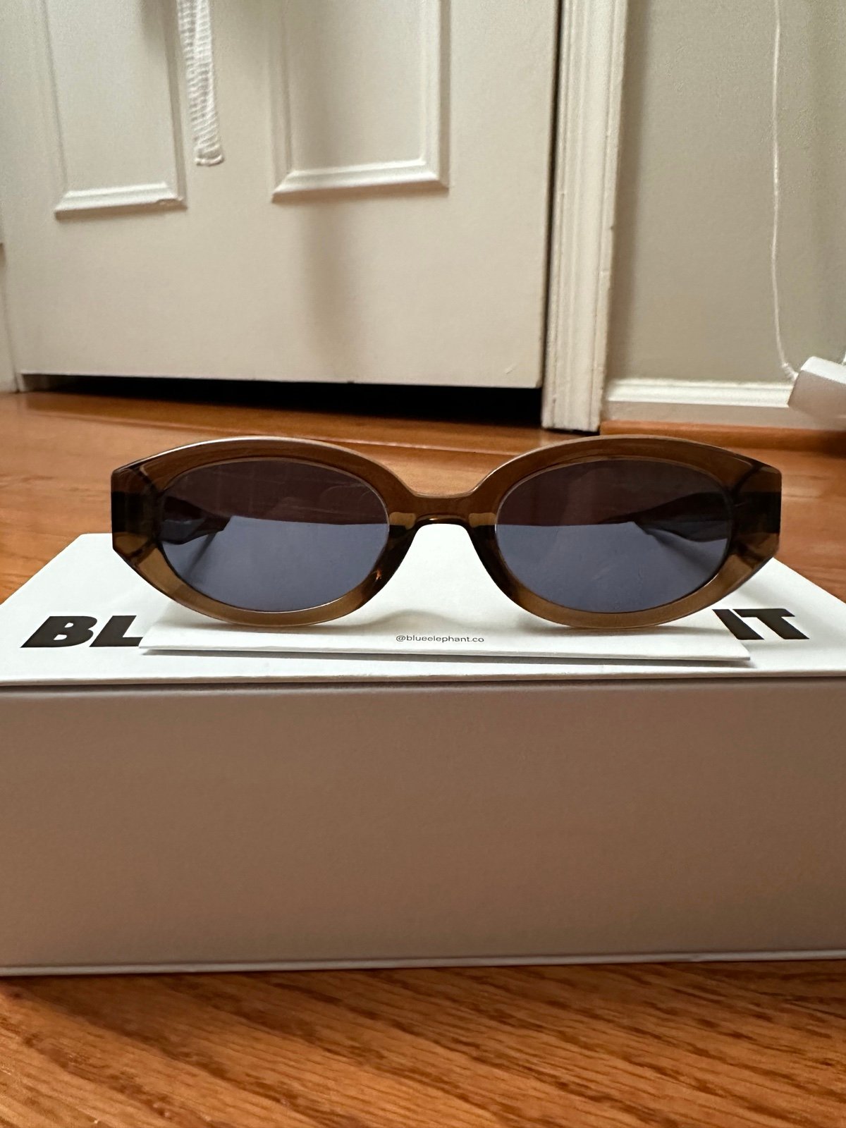 Blue Elephant brown glasses
