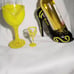 Wine bottle holder with glass and a shot of