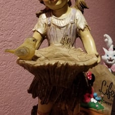Garden Solar Girl Holding Basket & Bird, Lights up and Solar Powered, Brand New.