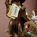 Garden Solar Girl Holding Basket & Bird, Lights up and Solar Powered, Brand New.