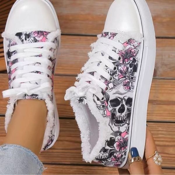 Skull Print Canvas sneakers, lace Up with raw trim to enhance the look.
