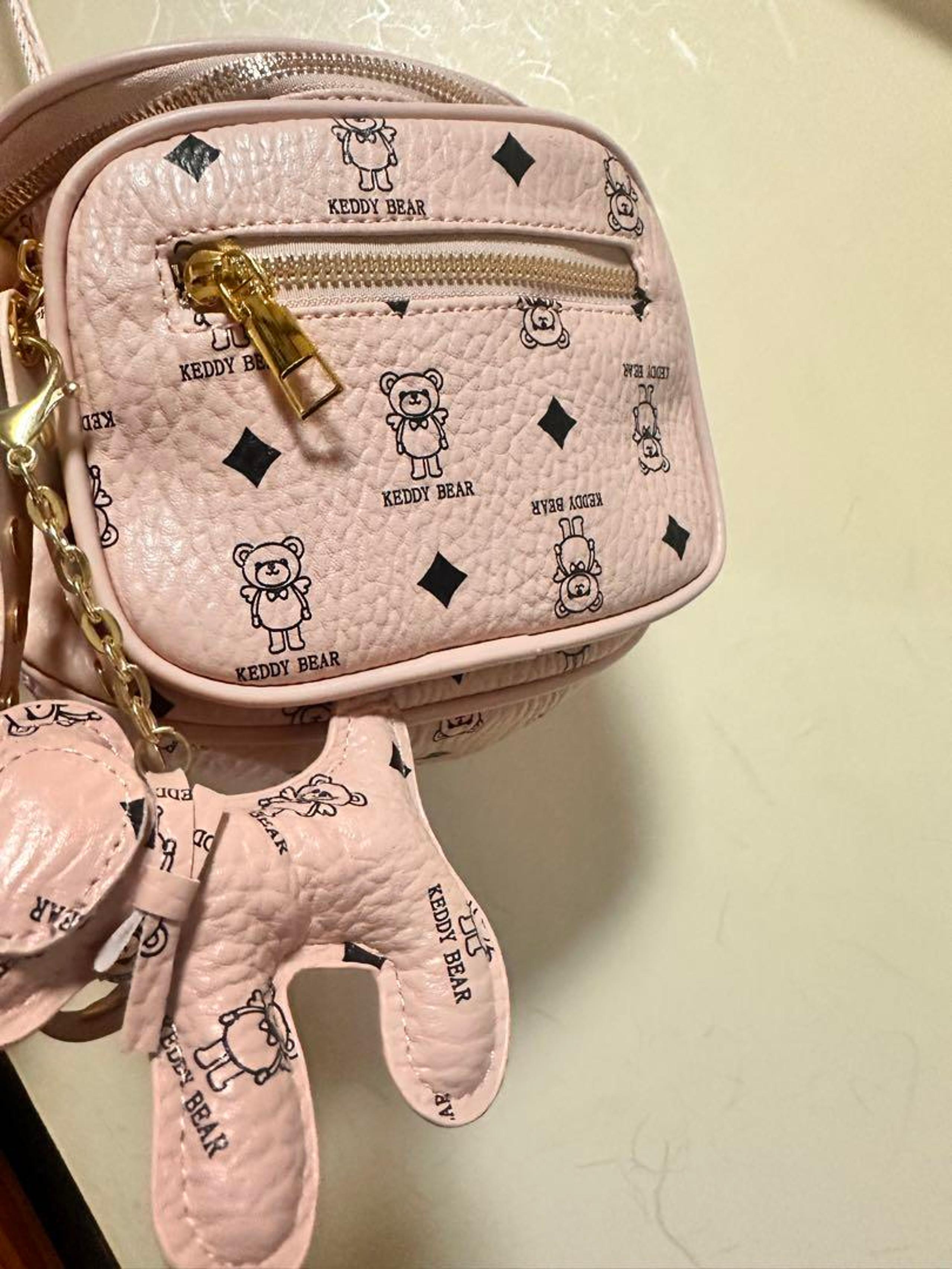Pink shoulder bag for women.