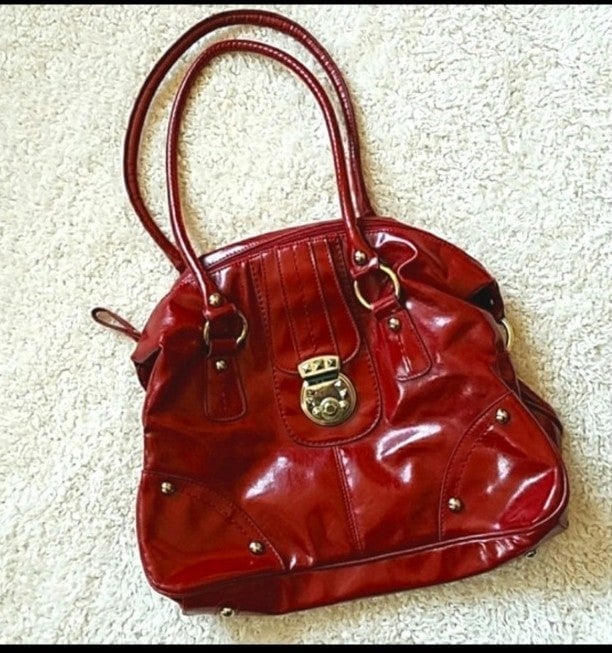 DAISY FUENTES DEEP RED HANDBAG