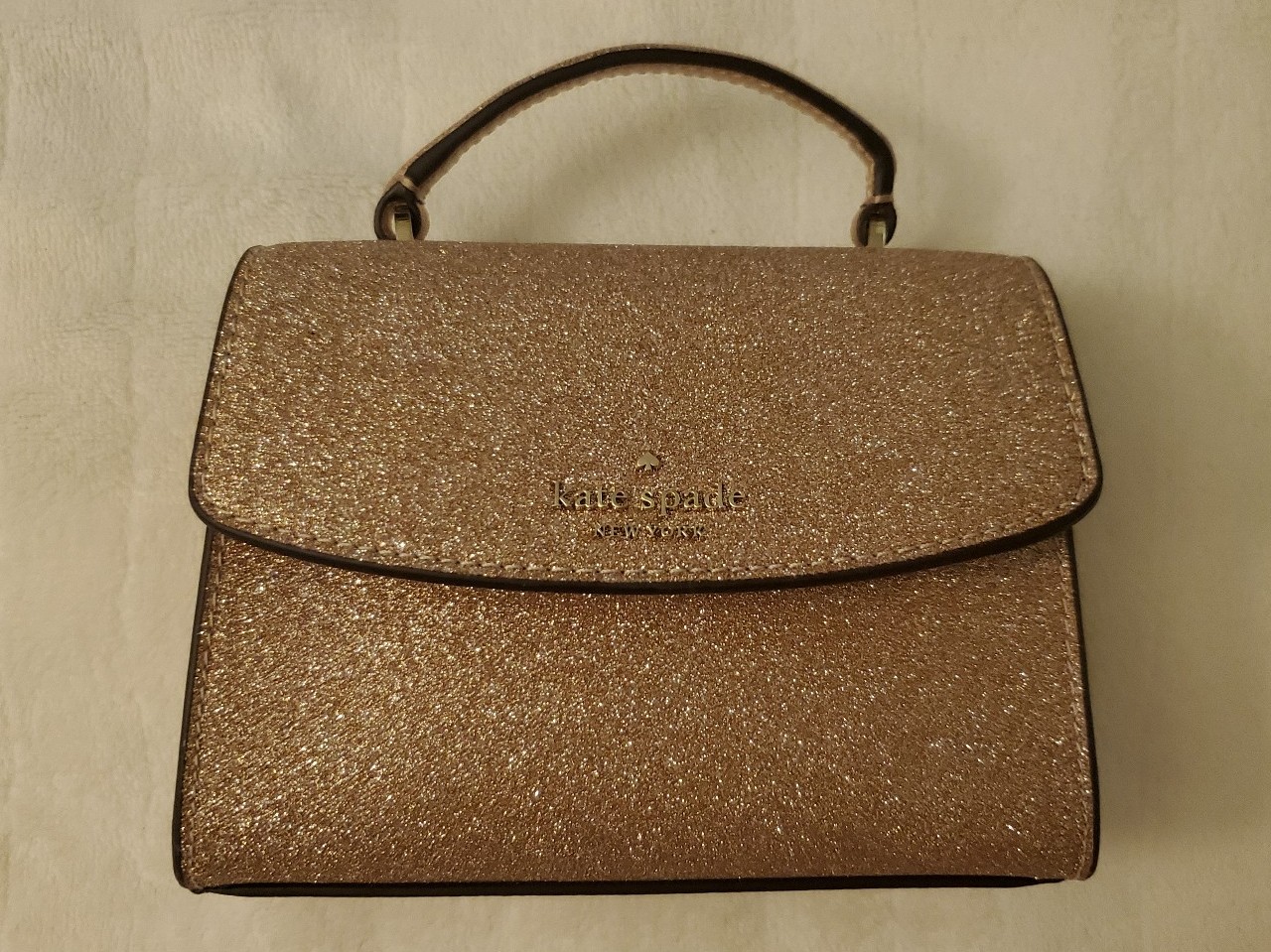 Kate Spade New York Darcy Rose Gold Glitter Micro Satchel