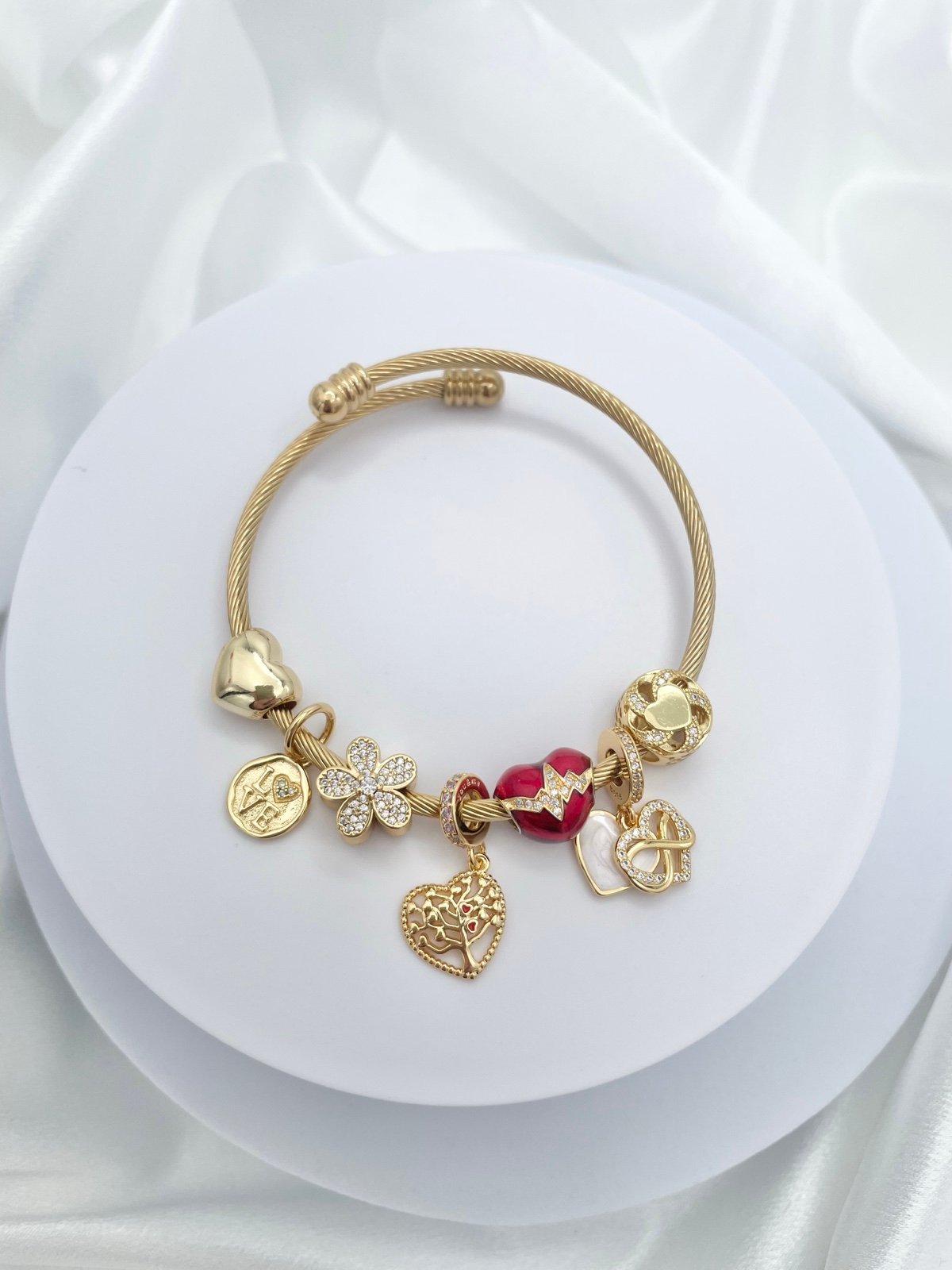 Linx Stainless Steel Gold Twisted Cable Bangle with Red Love and Heart Charms