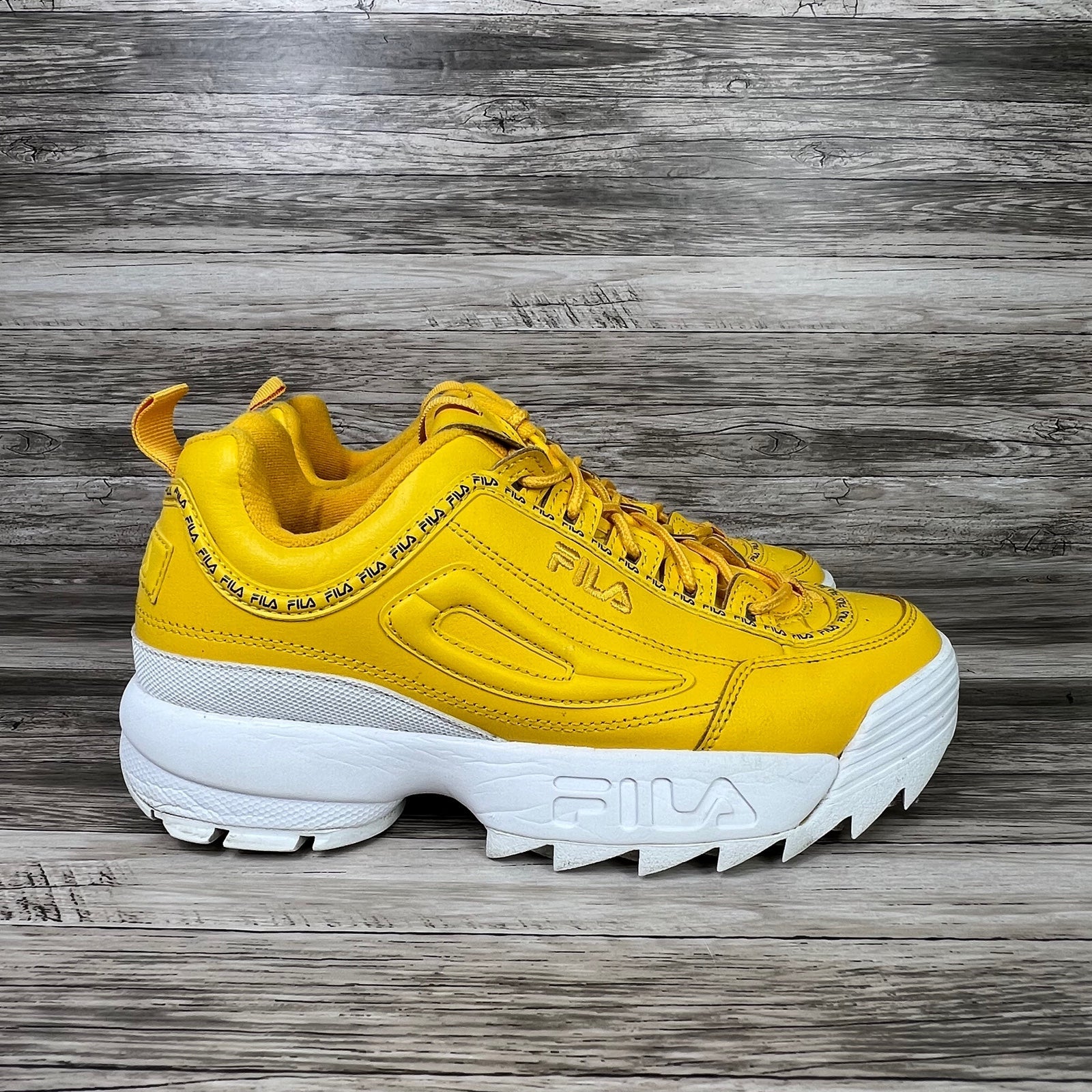 white and yellow filas