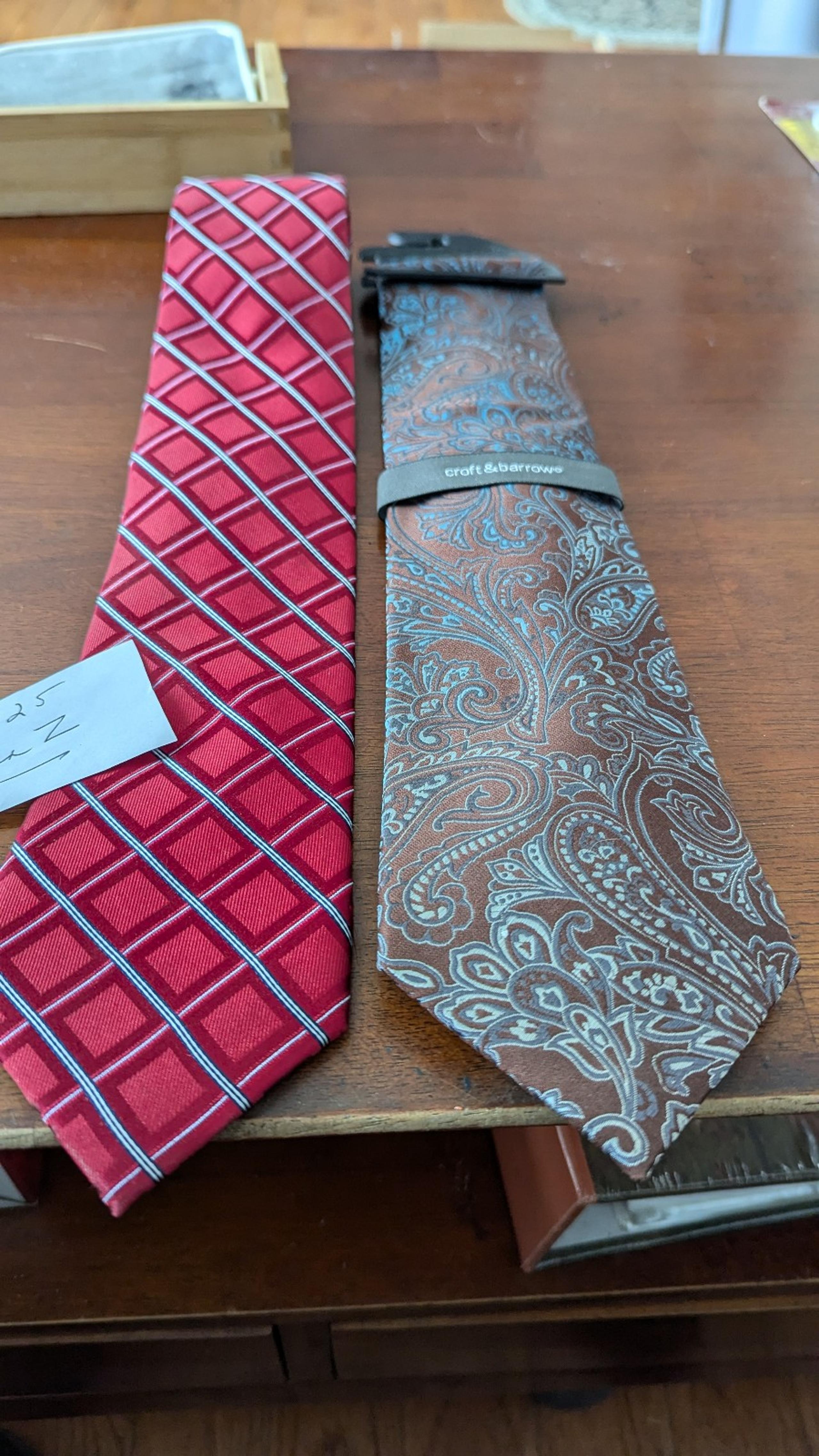 Two brand new with tags 100 percent silk men's ties.