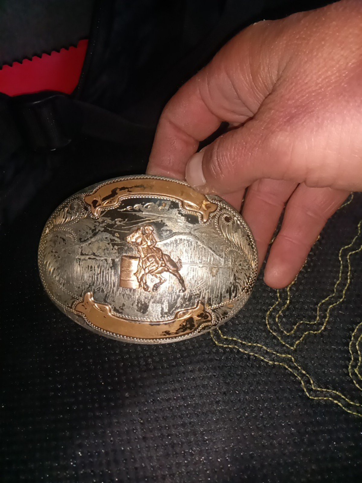 Rodeo cowgirl belt buckel