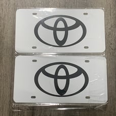 Toyota white Brand New Front Vanity Metal Plate Frame Holder (2 Pack)