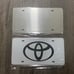 Toyota white Brand New Front Vanity Metal Plate Frame Holder (2 Pack)