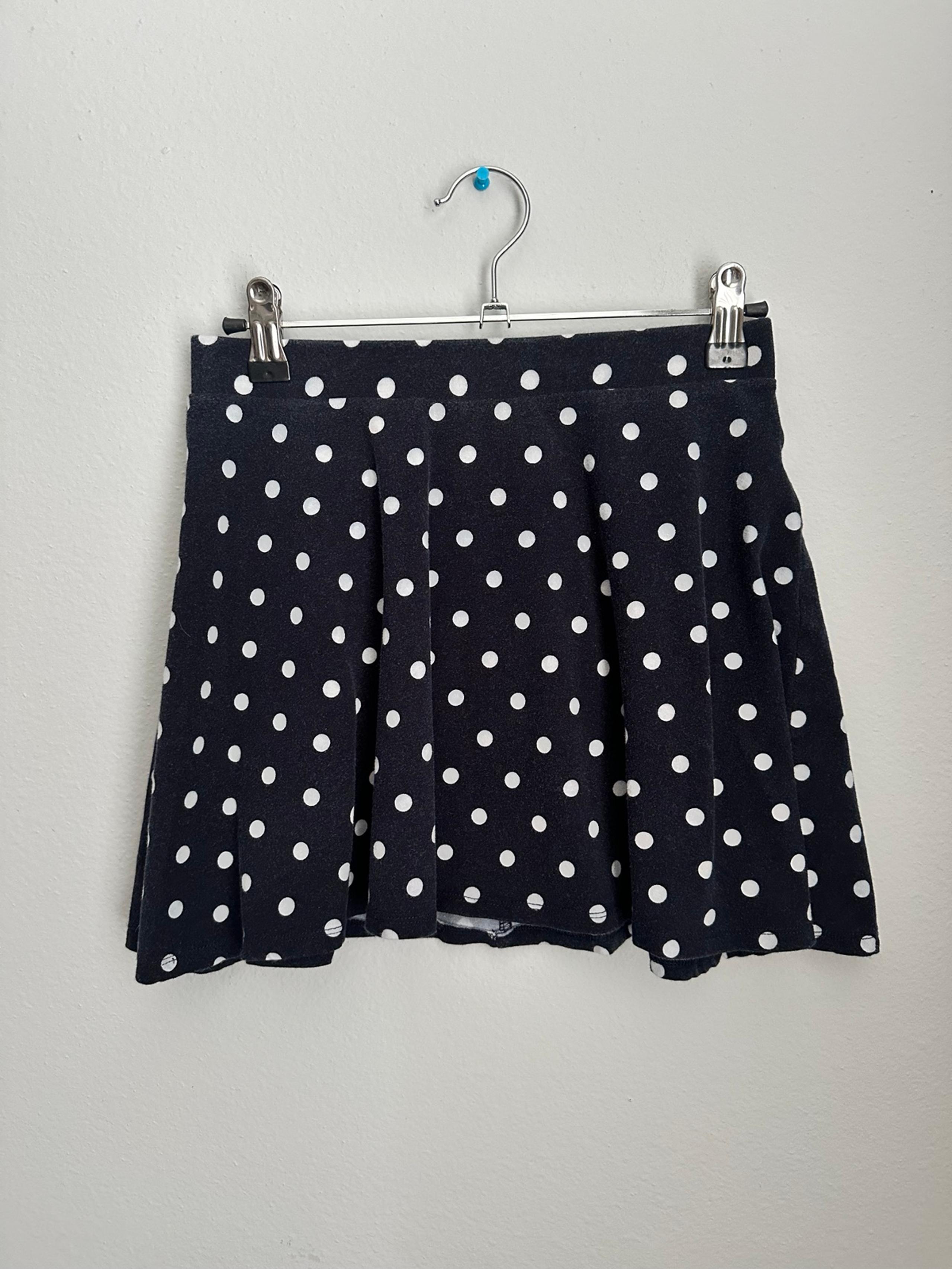 Navy blue white polka dot skirt. Size small.