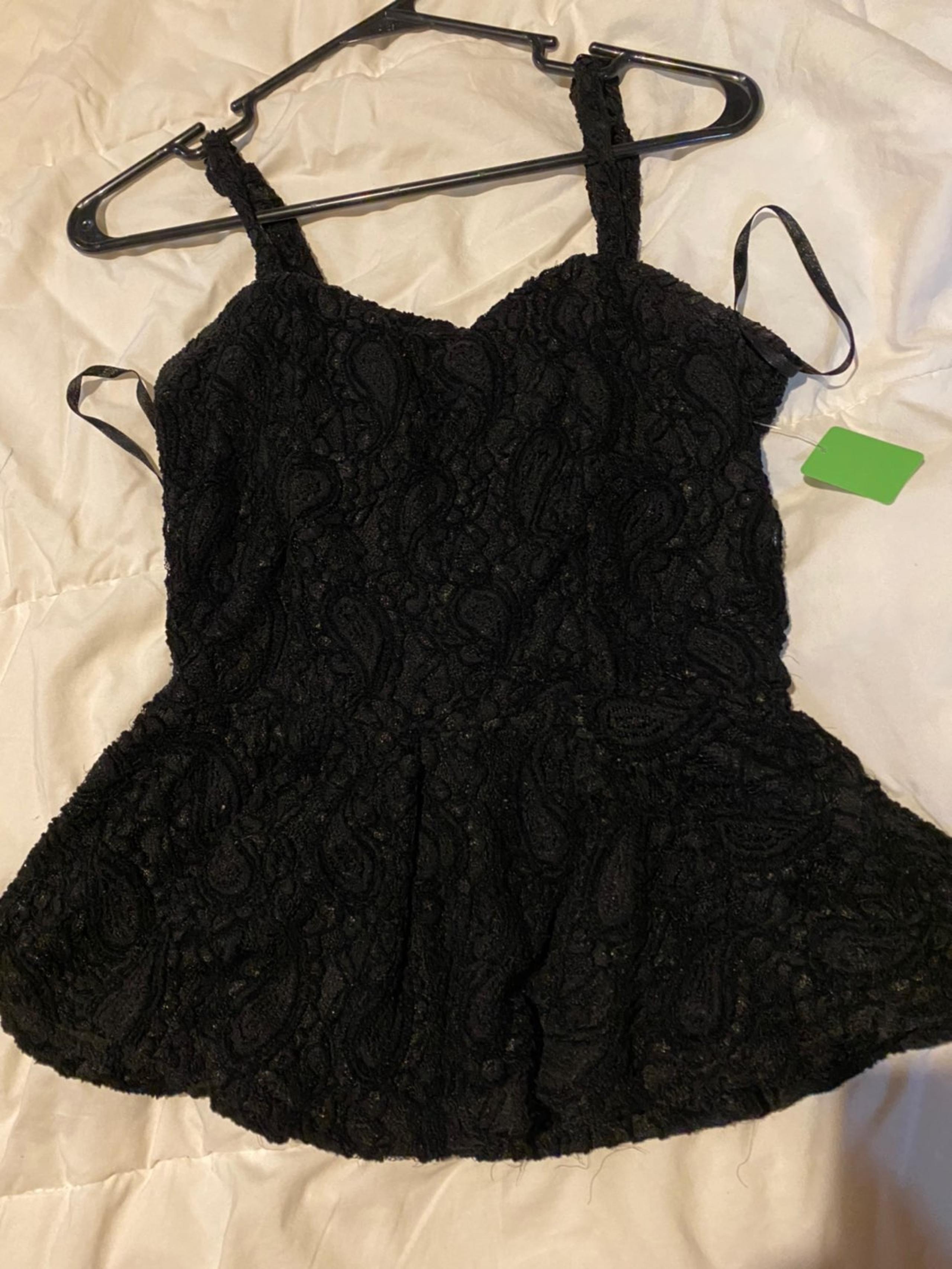 Peplum top. Shipping included in price