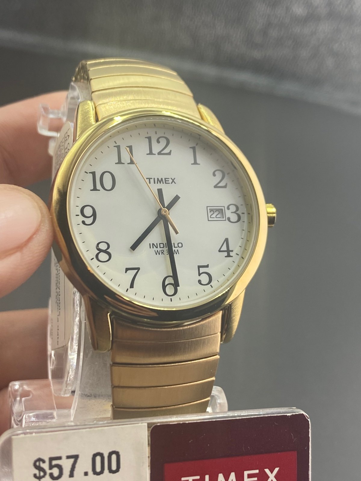 Timex Men Indiglo watch. Goldtone Color Stainless Steel It Stretching band E