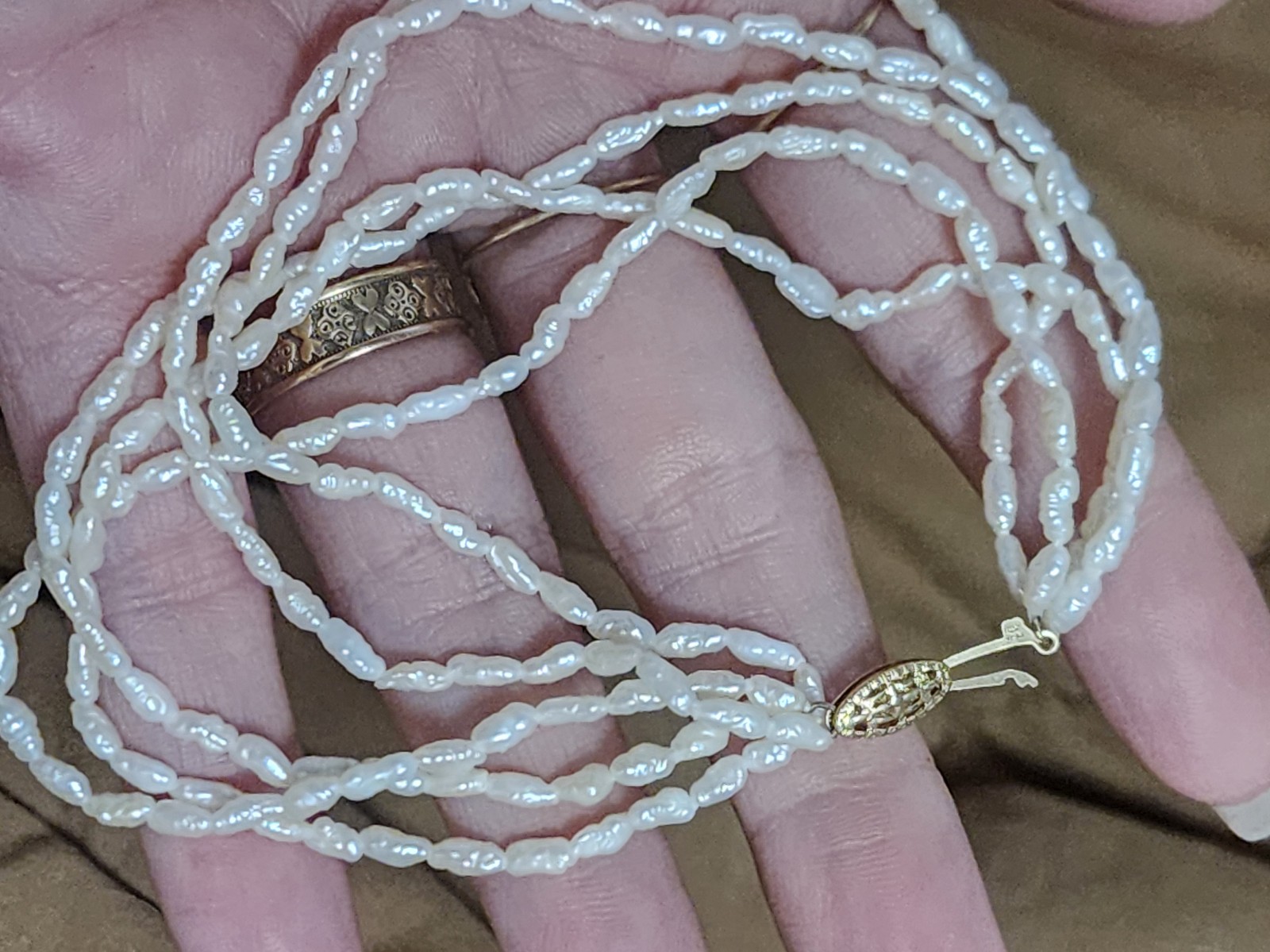 14k gold and pearl layered bracelet