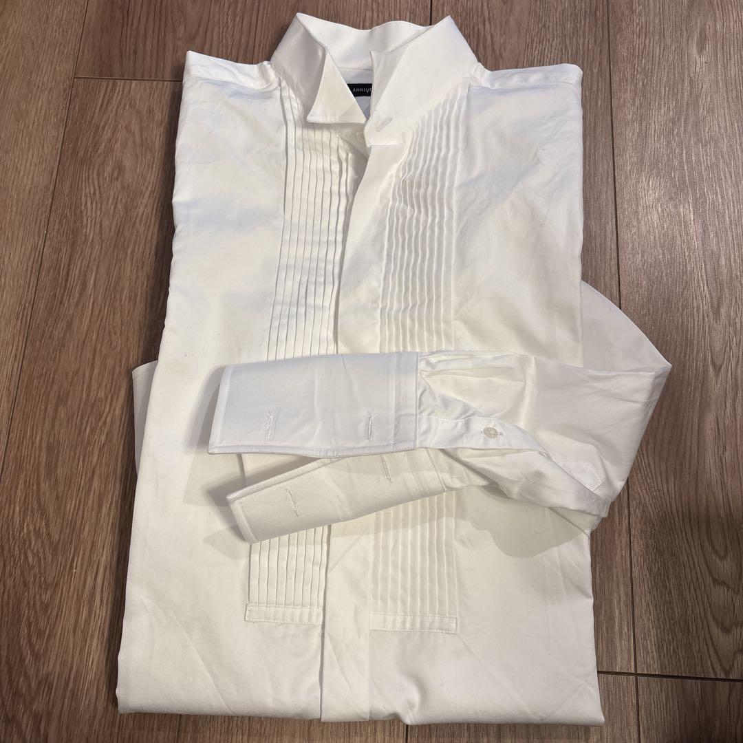 Tuxedo, dress shirt, accessories.
