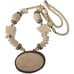 Carved bone elephant medallion necklace