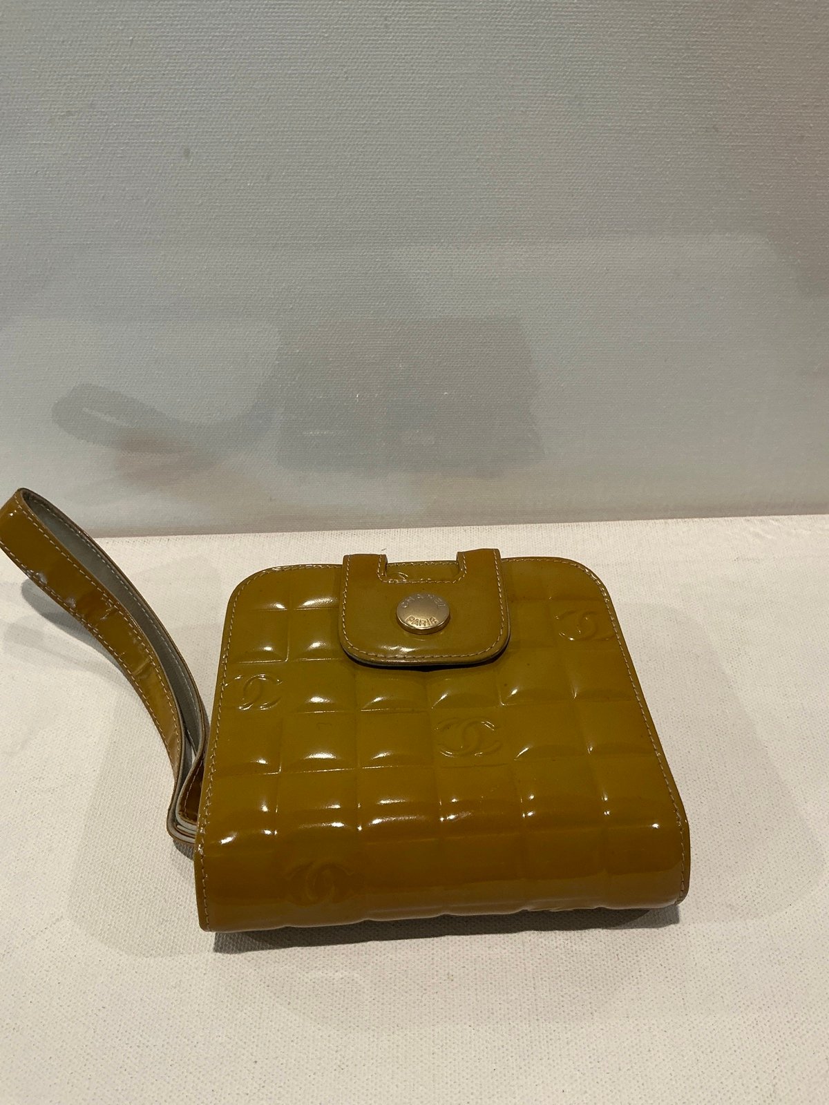 Rare Pre-Owned Chanel Chocolate Bar Bifold Patent Leather Yellow wrist wallet.