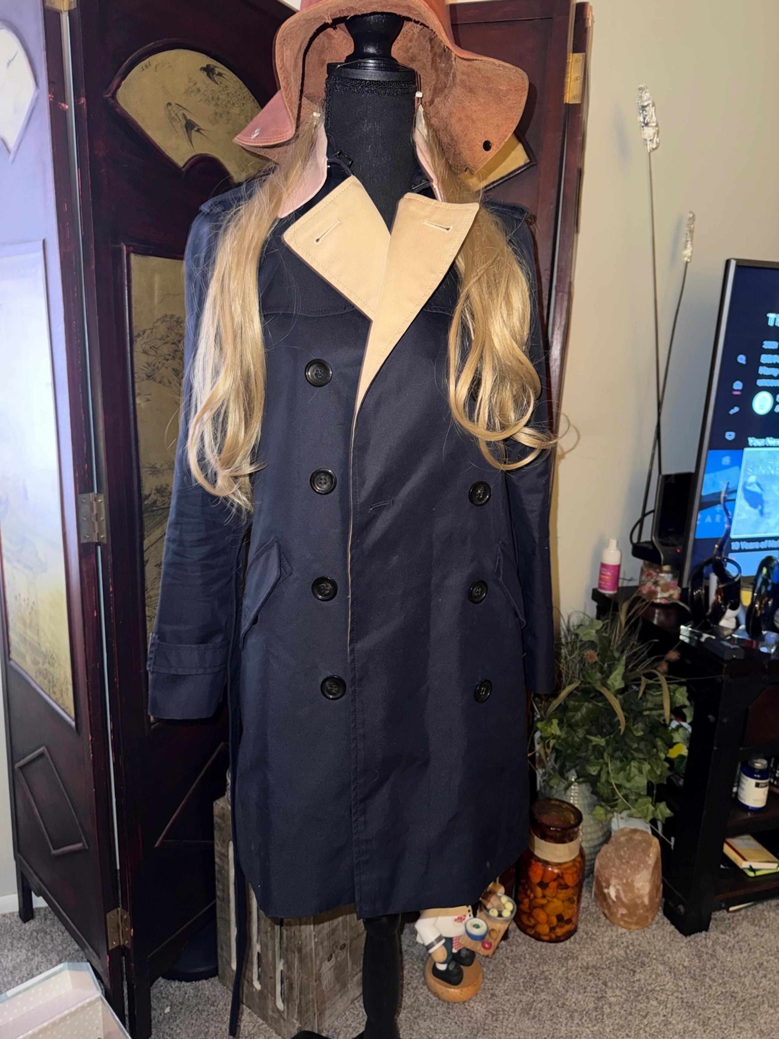 Coach women’s mid length black rain coat size xs