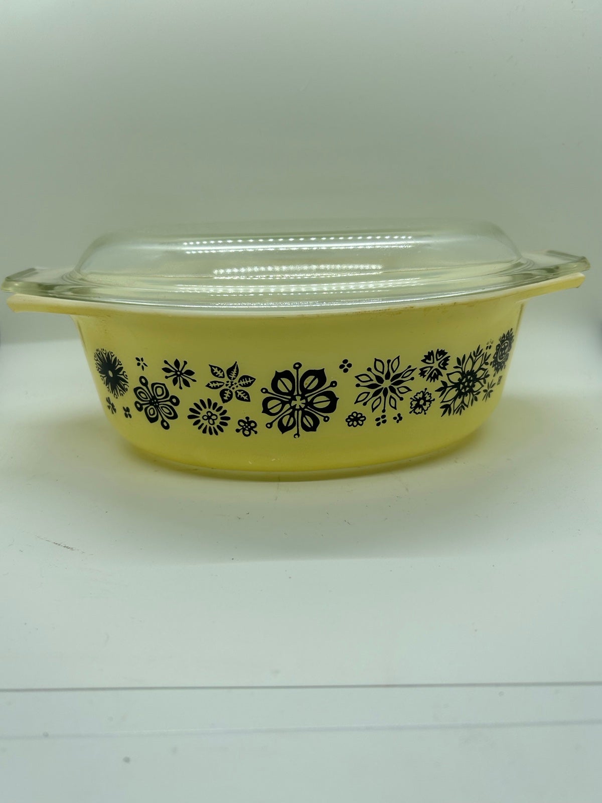 Vintage Pyrex “pressed flowers” casserole dish