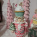 Two Pastel Nutcrackers / Toy Soldiers with cupcakes and gingerbread accents