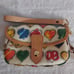 DOONEY & BOURKE RETRO RAINBOW HEARTS WRISTLET #6