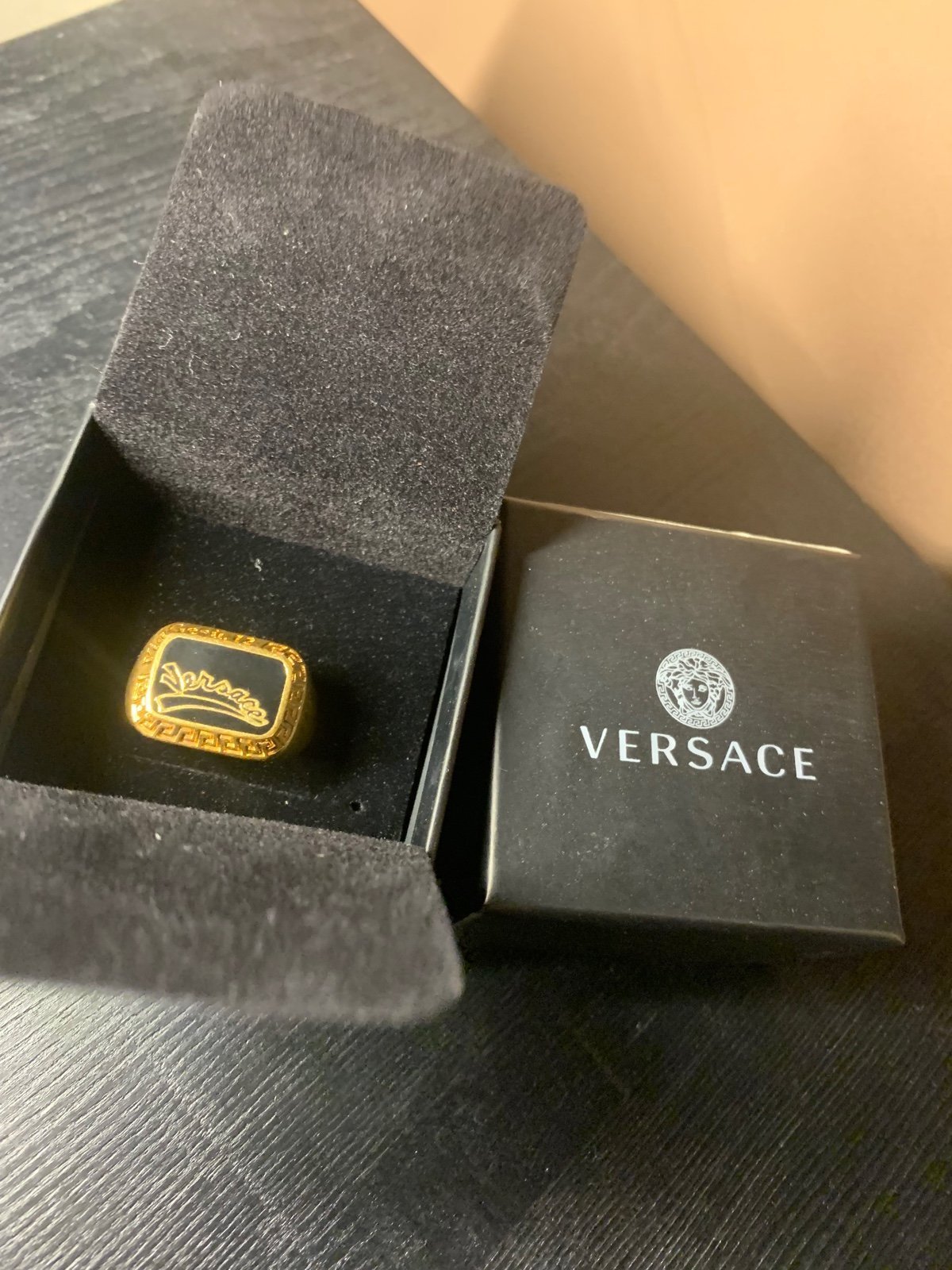 Versace gold and black varsity ring