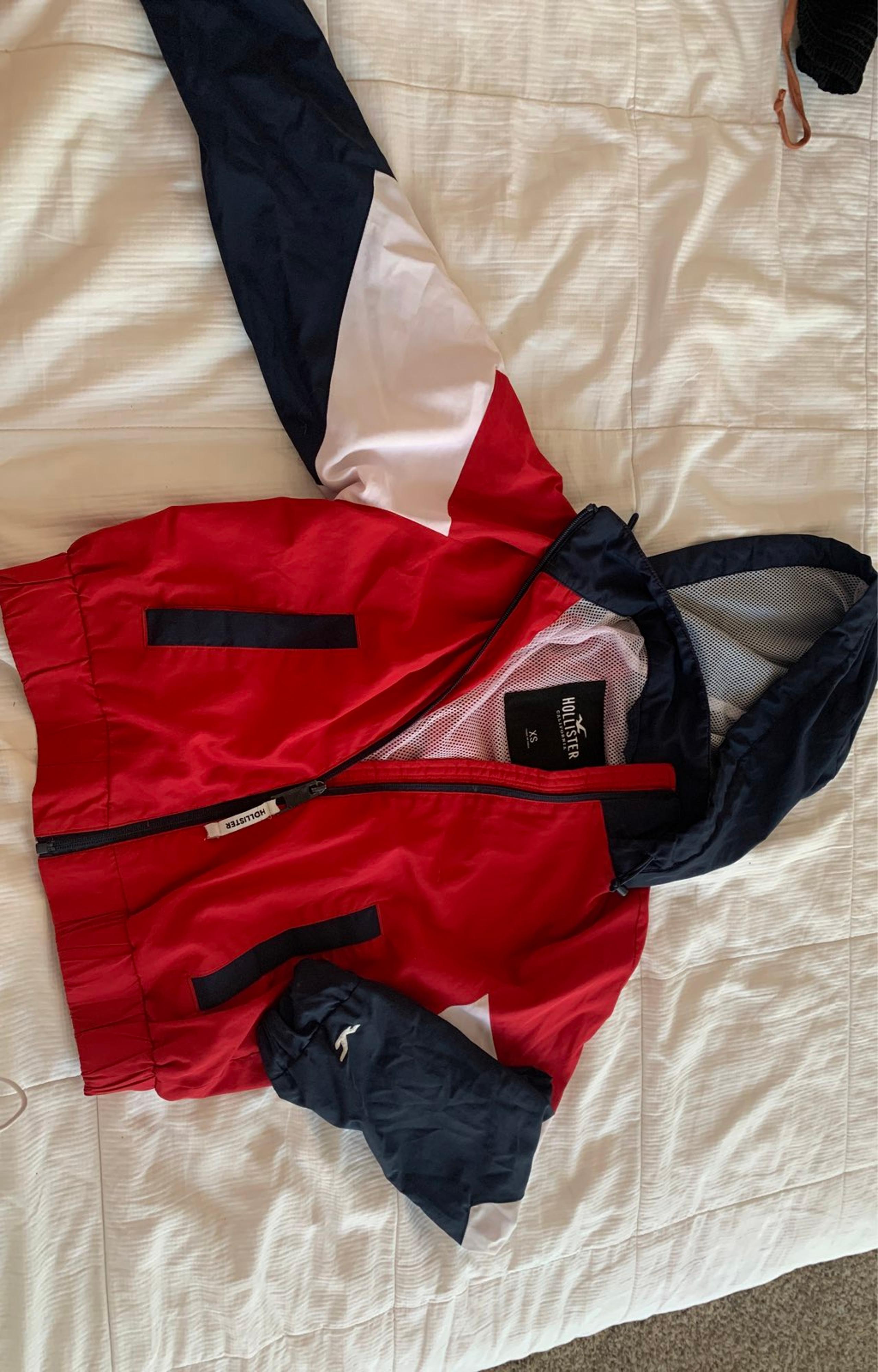 red,white,navy blue windbreaker